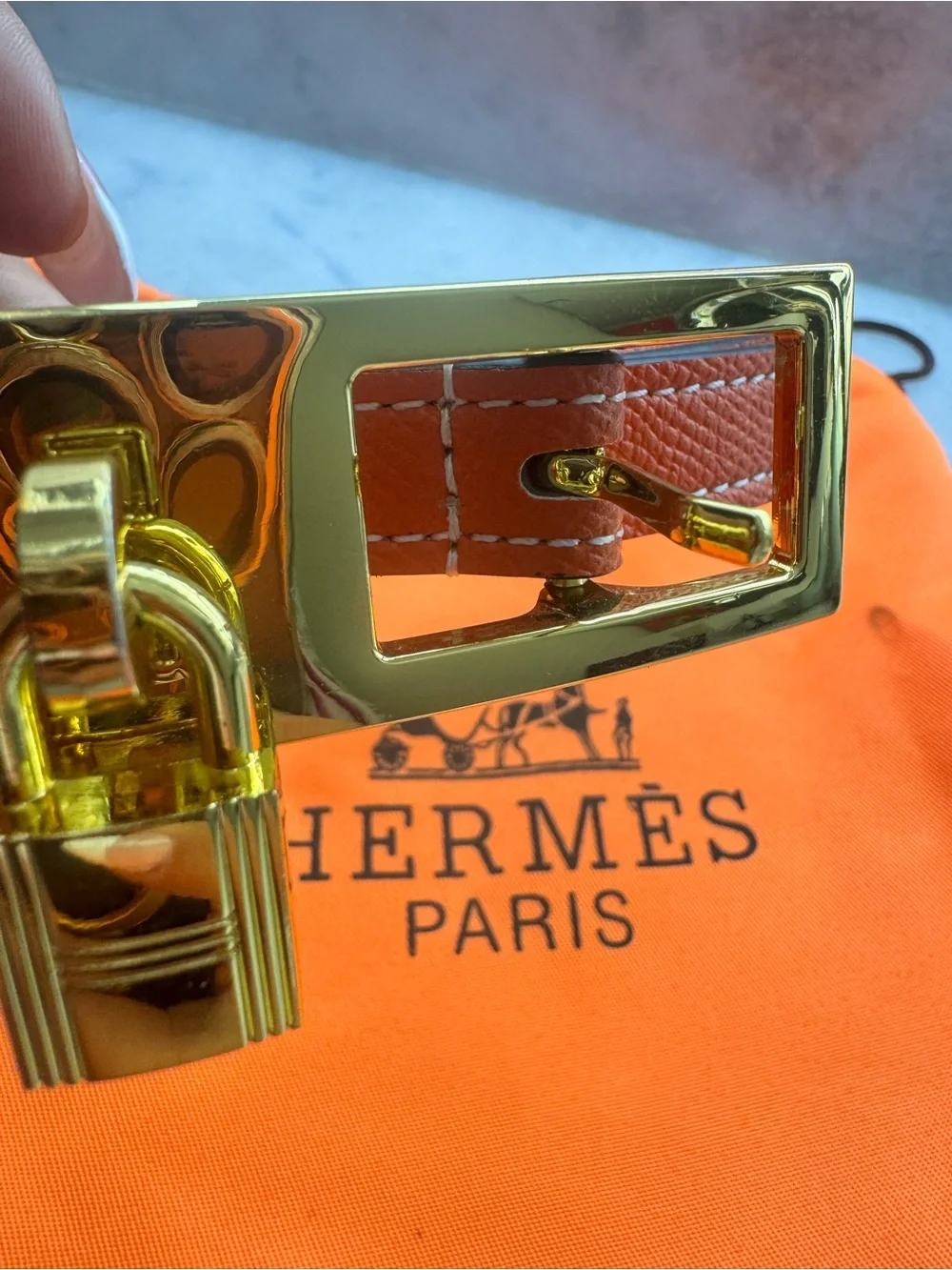 Hermès Orange and gold belt with a classic lock